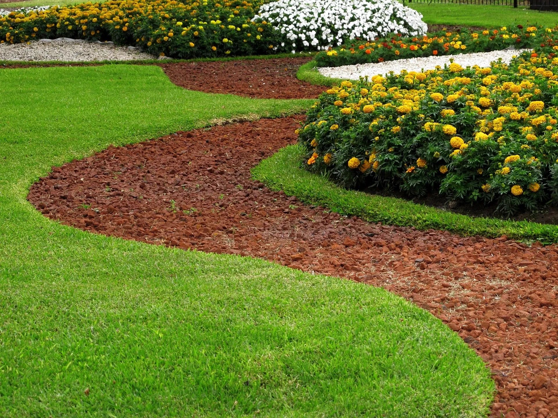 Beautiful landscaped garden by B & H Specialties